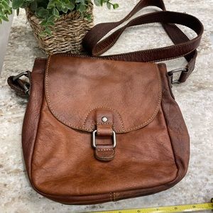 Jack George’s brown crossbody purse